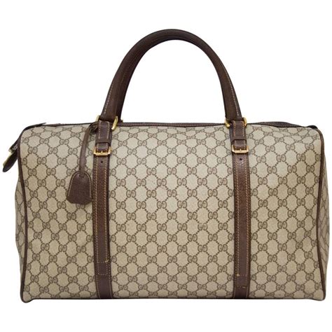 replica gucci weekender bag|Gucci duffle bag with wheels.